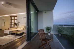 Balcony opens up to bird's eye view of the surrounding city