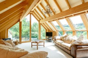 Floor to ceiling glasses allow for view of the surrounding nature