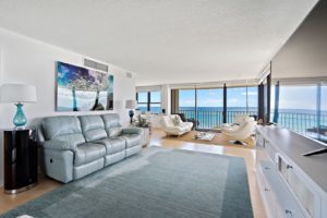 Living area offers breathtaking view of the nearby sea