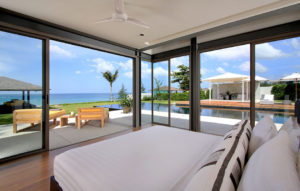 Bedroom opens up to stunning view of the beachfront