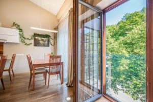 Living area also opens up directly to view of surrounding nature